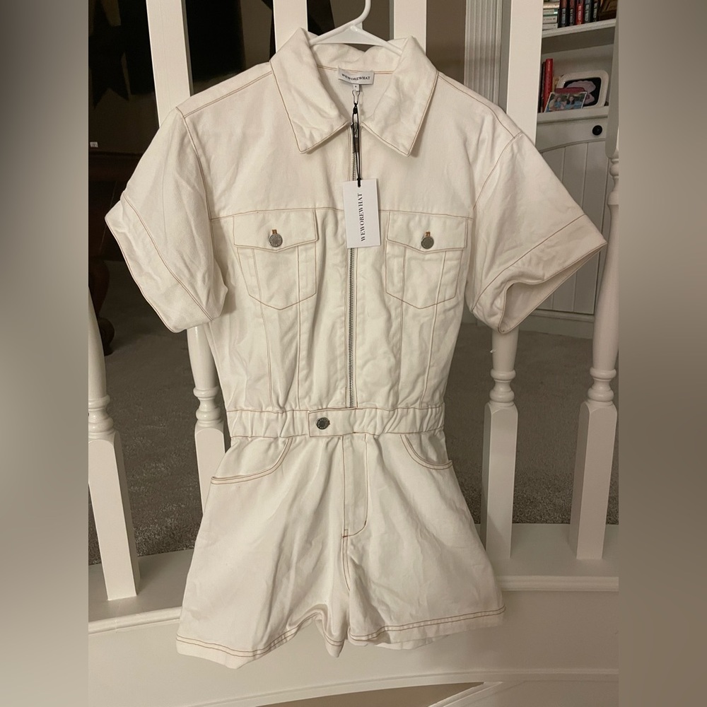 Brand new with tags never worn! White WeWoreWhat denim romper.